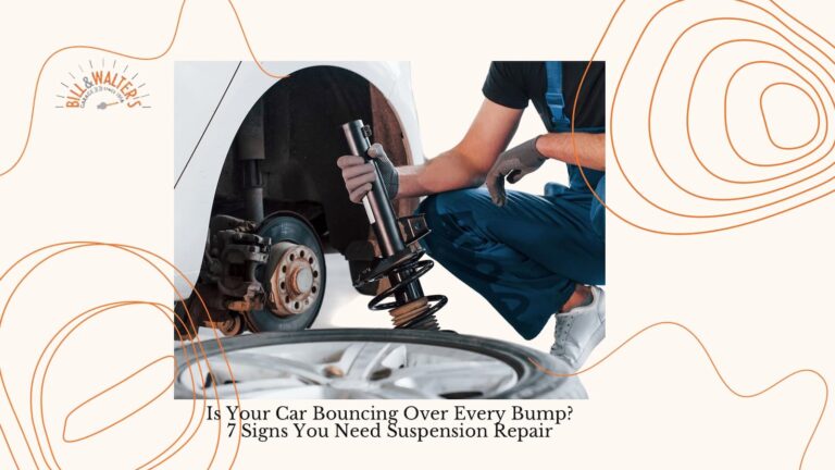Mechanic performing suspension repair on car in Burnaby garage